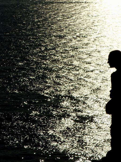 Schatten einer Frau am Meer vom 11.08.2014