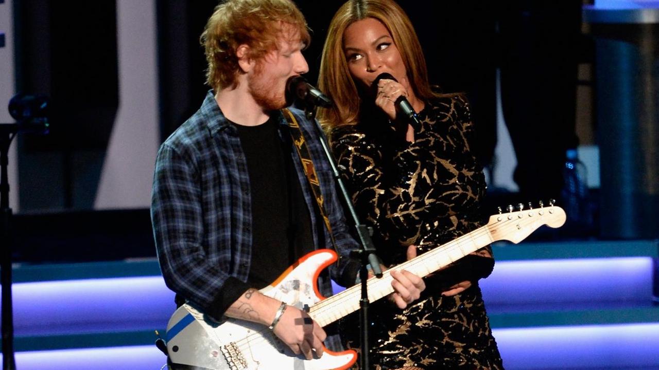 LOS ANGELES, CA - FEBRUARY 10: Recording artists Ed Sheeran (L) and Beyonce perform onstage during Stevie Wonder: Songs In The Key Of Life - An All-Star GRAMMY Salute at Nokia Theatre L.A. Live on February 10, 2015 in Los Angeles, California. (Photo by Kevork Djansezian/Getty Images)