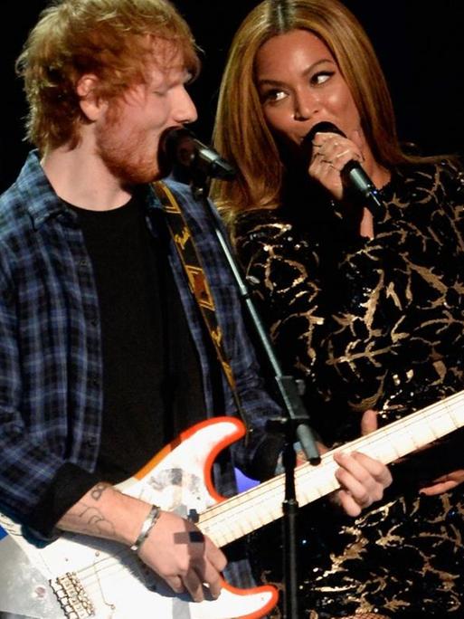 LOS ANGELES, CA - FEBRUARY 10: Recording artists Ed Sheeran (L) and Beyonce perform onstage during Stevie Wonder: Songs In The Key Of Life - An All-Star GRAMMY Salute at Nokia Theatre L.A. Live on February 10, 2015 in Los Angeles, California. (Photo by Kevork Djansezian/Getty Images)