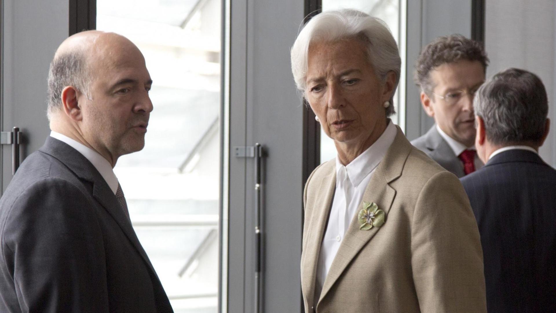 Der EU-Währungskommissar Pierre Moscovici mit IWF-Chefin Christine Lagarde vor dem Treffen mit Griechenlands Ministerpräsident Alexis Tsipras.