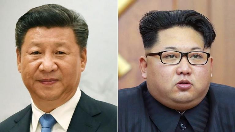 Fotocollage mit Porträts von Xi Jinping (links) und Kim Jong-un (rechts) Fotocollage mit Porträts von Xi Jinping (links) und Kim Jong-un (rechts)