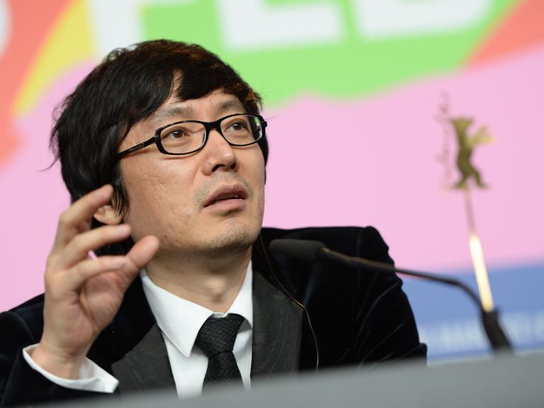 Der chinesische Regisseur Diao Yinan bei einer Pressekonferenz während der 64. Internationalen Filmfestspiele in Berlin, Februar 2014