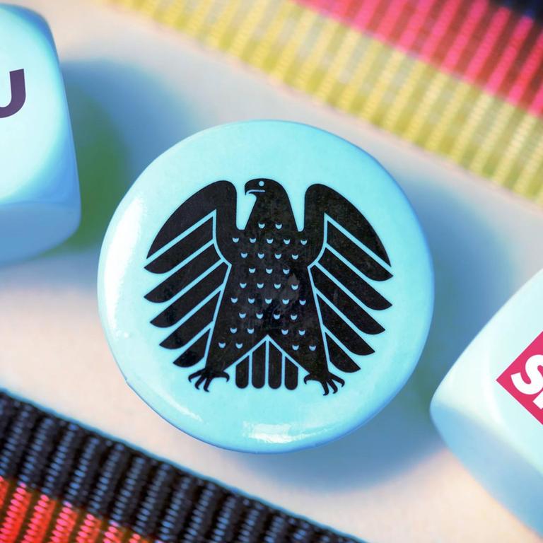 Würfel mit dem Logo von CDU und SPD, Symbolfoto für die Große Koalition 