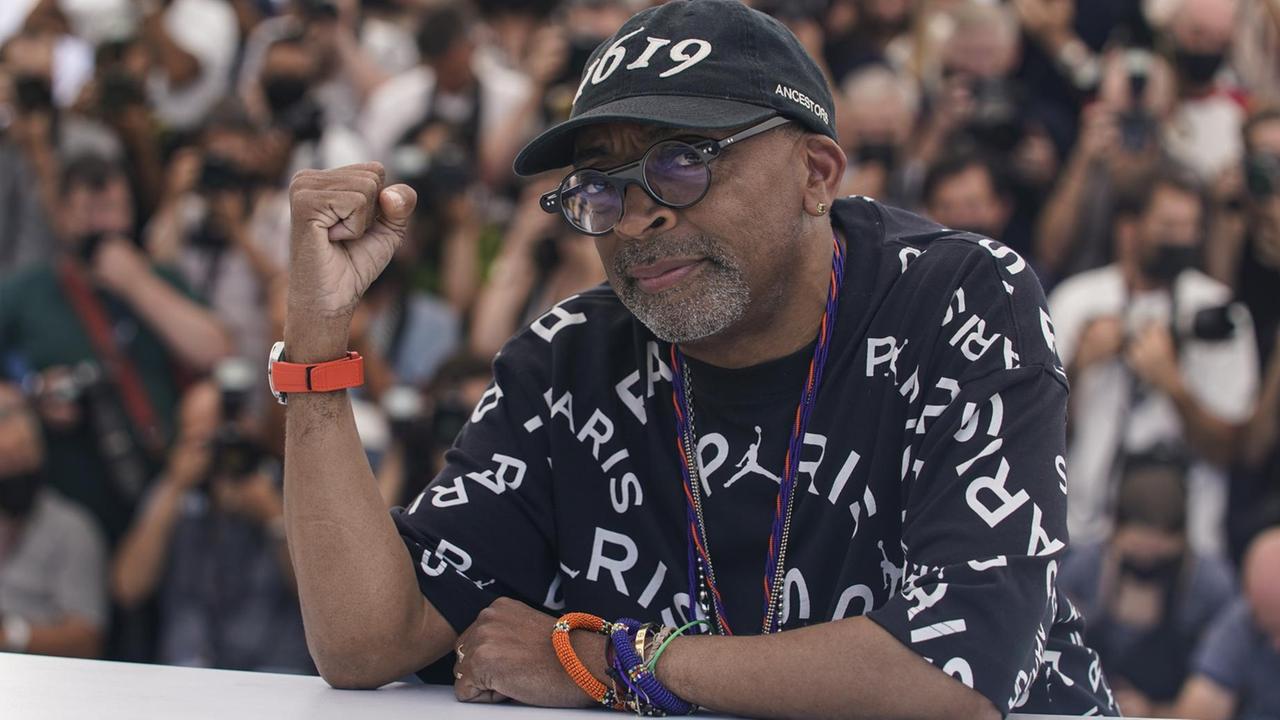 Jury president Spike Lee poses for photographers at the photo call for the jury at the 74th international film festival, Cannes, southern France, Tuesday, July 6, 2021. (AP Photo/Brynn Anderson)