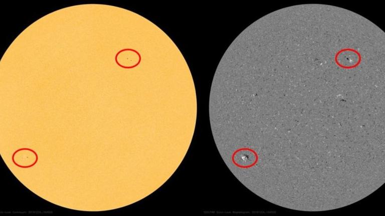 Sonnenflecken in hohen Breiten (fernab des Sonnenäquators) künden den Beginn des neuen Fleckenzyklus an