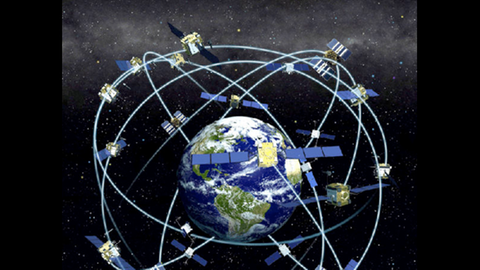 Eine Illustration zeigt das Netz an GPS-Satelliten, das die Erde umspannt. 
