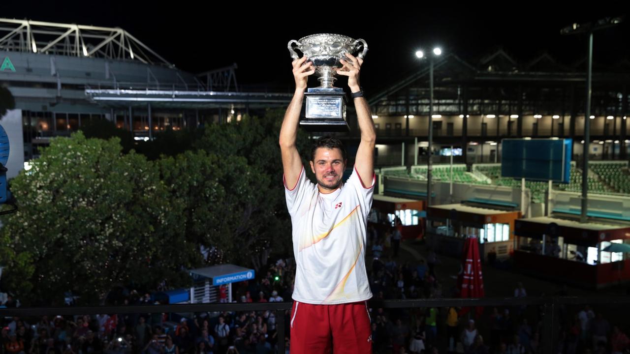 epa04042679 A handout photo taken and released by Tennis Australia on 26 January 2014 shows Stanislas Wawrinka of Switzerland posing with his trophy at the Australian Open Grand Slam tennis tournament in Melbourne, Australia, 26 January 2014. EPA/FIONA HA epa04042679 A handout photo taken and released by Tennis Australia on 26 January 2014 shows Stanislas Wawrinka of Switzerland posing with his trophy at the Australian Open Grand Slam tennis tournament in Melbourne, Australia, 26 January 2014. EPA/FIONA HA