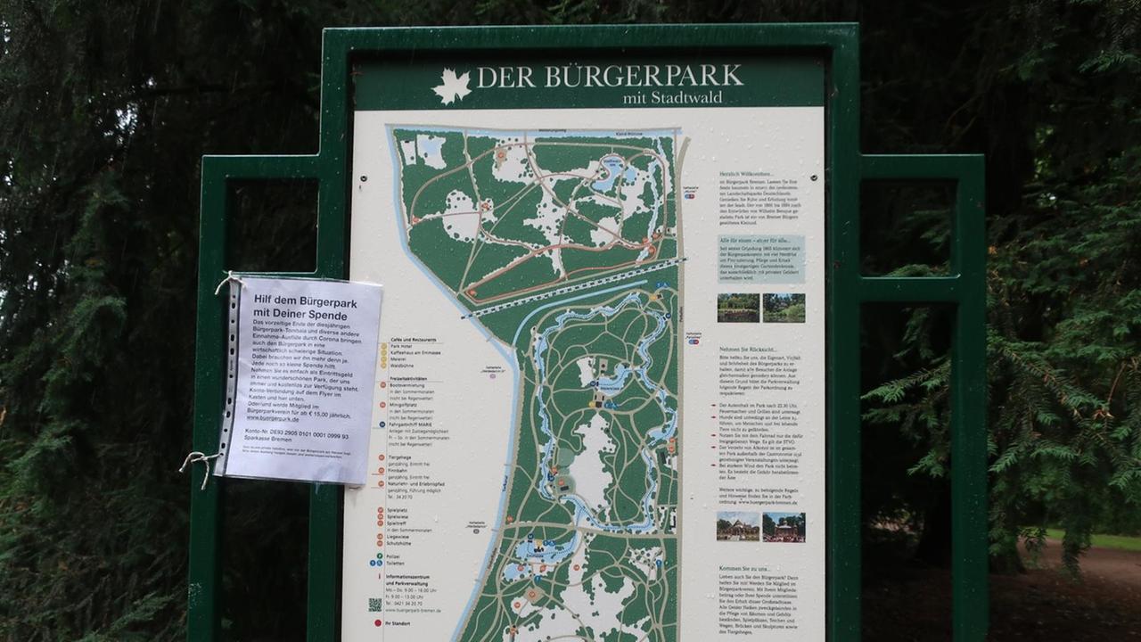 Spendenaufruf an die Parkbesucher auf dem Orientierungsplan im Bremer Bürgerpark.