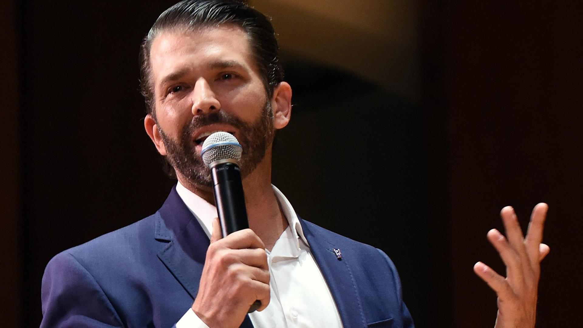 October 10, 2019, Gainesville, Florida, United States: Donald Trump, Jr. speaks at the University of Florida..The couple was paid $50,000 from student activity fees and tickets were distributed free of charge to students. The event drew hundreds of protesters outside the University Auditorium who objected to what they called a campaign rally. Trump, Jr and Guilfoyle spoke for less than a half hour each and answered a few questions submitted on Twitter. Several protesters were removed from the auditorium during the event. Gainesville United States PUBLICATIONxINxGERxSUIxAUTxONLY - ZUMAs197 20191010zaas197153 Copyright: xPaulxHennessyx