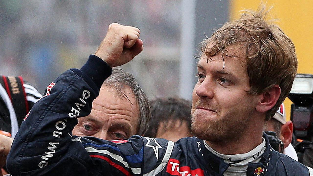 German Formula One driver Sebastian Vettel of Red Bull Racing celebrates after winning the 2012 Formula One World Championship after the Formula One Grand Prix of Brazil at Interlagos racetrack in Sao Paulo, Brazil, 25 November 2012. EPA/MARCELO SAYAO German Formula One driver Sebastian Vettel of Red Bull Racing celebrates after winning the 2012 Formula One World Championship after the Formula One Grand Prix of Brazil at Interlagos racetrack in Sao Paulo, Brazil, 25 November 2012. EPA/MARCELO SAYAO