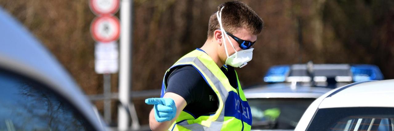 ABD0107_20200316 - SALZBURG - ÖSTERREICH: Grenzkontrollen der deutschen Polizei am Grenzübergang Freilassing zu Österreich am Montag, 16. März 2020. - FOTO: APA/BARBARA GINDL - 20200316_PD2412 | ABD0107_20200316 - SALZBURG - ÖSTERREICH: Grenzkontrollen der deutschen Polizei am Grenzübergang Freilassing zu Österreich am Montag, 16. März 2020. - FOTO: APA/BARBARA GINDL - 20200316_PD2412 |