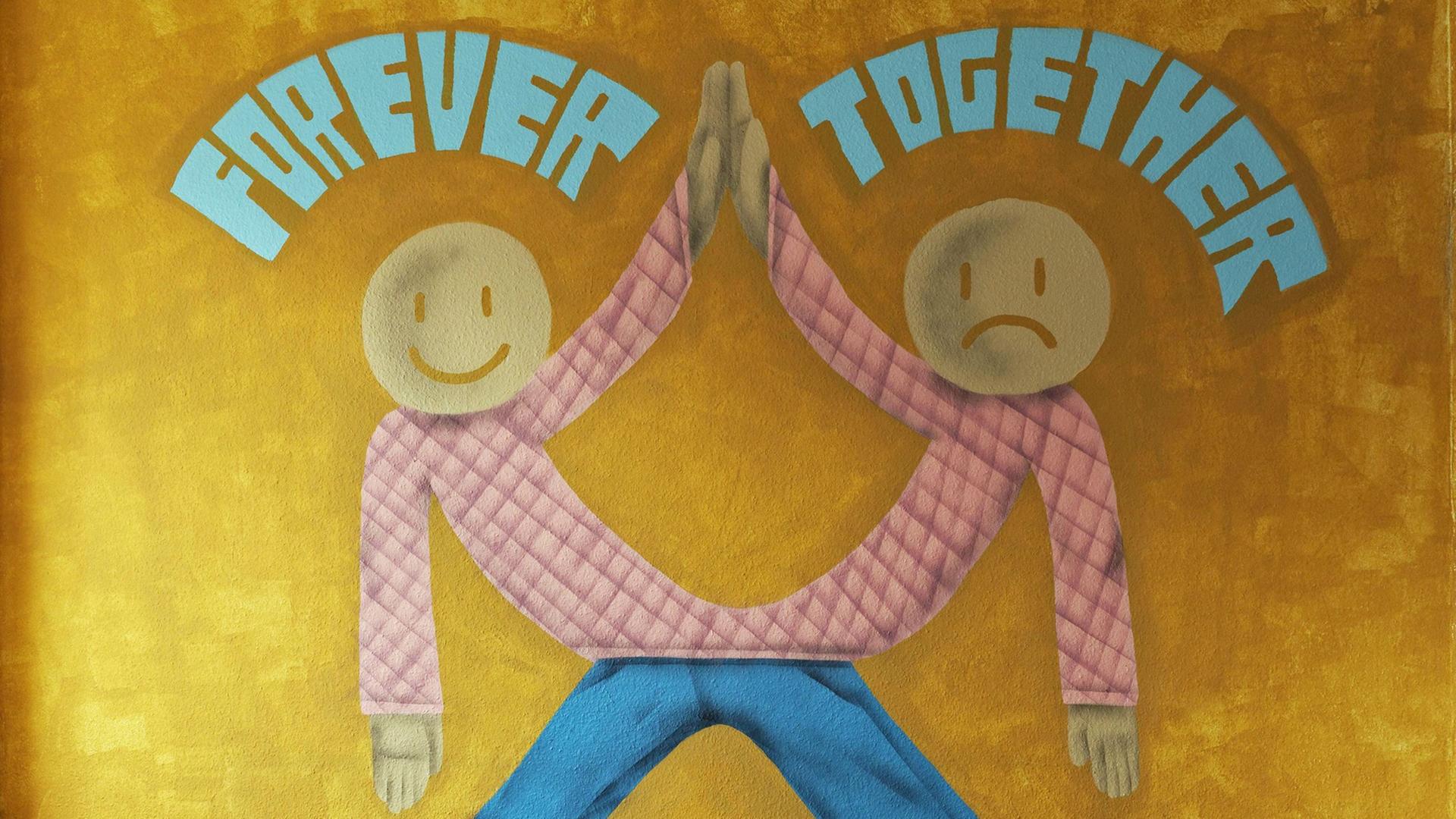 Forever together: Ein Wandbild beim 40 Grad Urban-Art-Festival in Düsseldorf zeigt zwei zusammengewachsene Figuren.