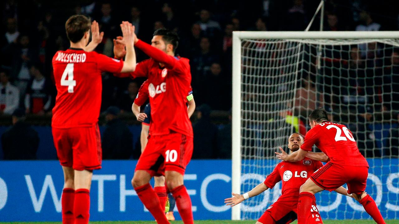 epa04122207 Bayer Leverkusen players reacts after Sidney Sam (2-R) scored the 1-0 lead during the UEFA Champions League round of 16 second leg soccer match between Paris Saint-Germain and Bayer Leverkusen at Parc des Princes stadium, in Paris, France, 12 epa04122207 Bayer Leverkusen players reacts after Sidney Sam (2-R) scored the 1-0 lead during the UEFA Champions League round of 16 second leg soccer match between Paris Saint-Germain and Bayer Leverkusen at Parc des Princes stadium, in Paris, France, 12