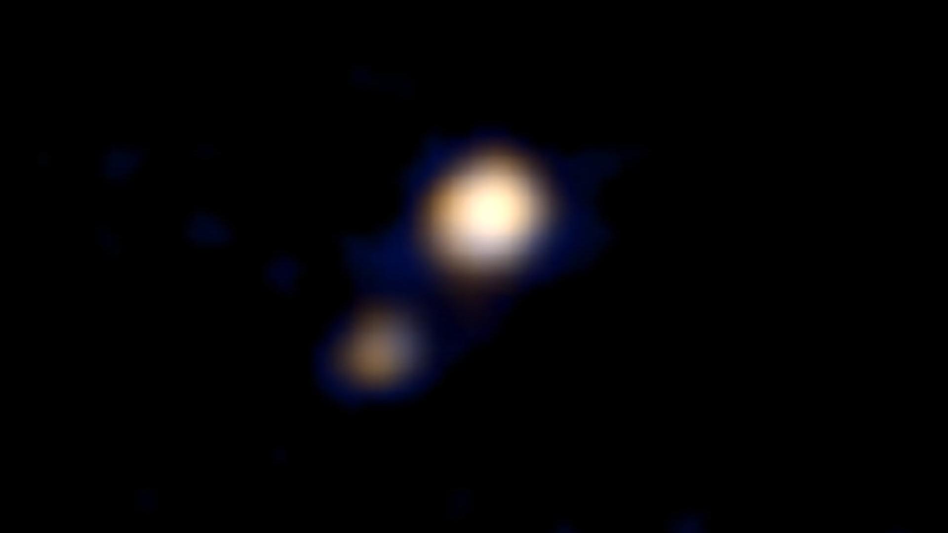 Der Asteroid 134340 mit seinem Mond Charon
