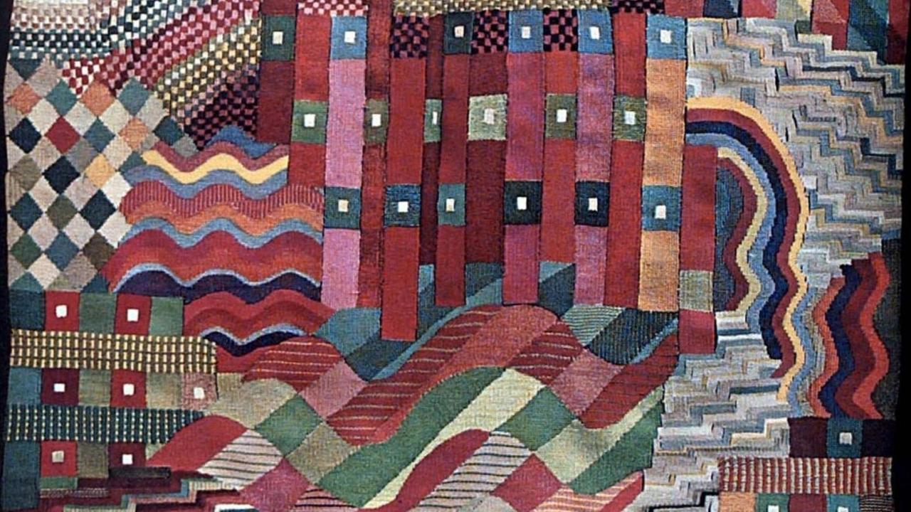 Leinen- und Baumwollteppich von Gunta Stölzl, der im Bauhaus hängt.