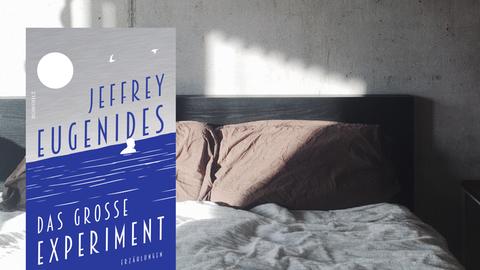 Cover von Jeffrey Eugenides Buch "Das große Experiment". Im Hintergrund ist ein Doppelbett zu sehen.