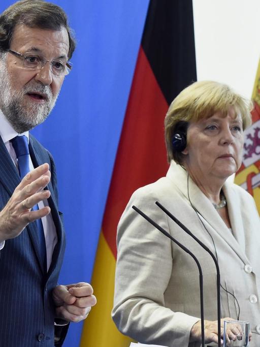 Bundeskanzlerin Merkel und der spanische Ministerpräsident Rajoy bei einer Pressekonferenz in Berlin.