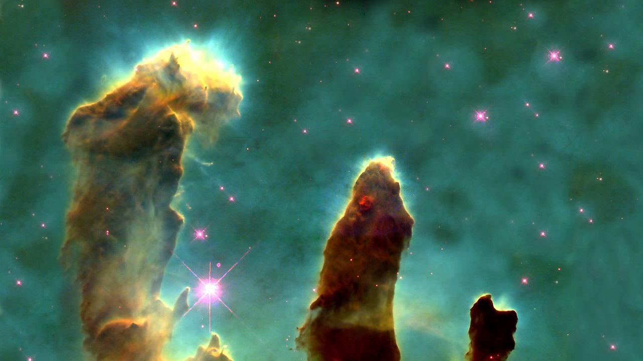 M16 mit den berühmten "Säulen der Schöpfung" - eine Hubble-Ikone