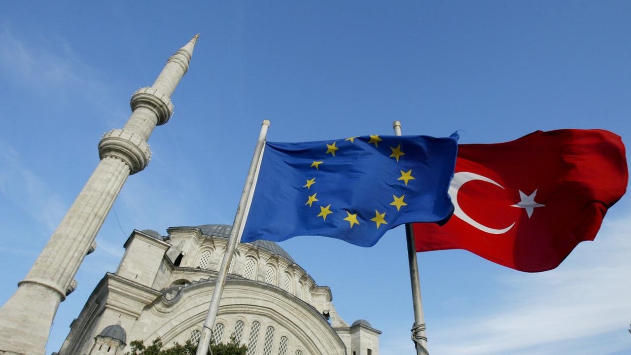 Flags of Turkey and the European Union are seen in front of  a mosque  in Istanbul, Turkey, Tuesday, Oct. 4, 2005. Muslim but secular Turkey, began talks for eventual membership in the predominantly Christian European Union, a step that Prime Minister Rec