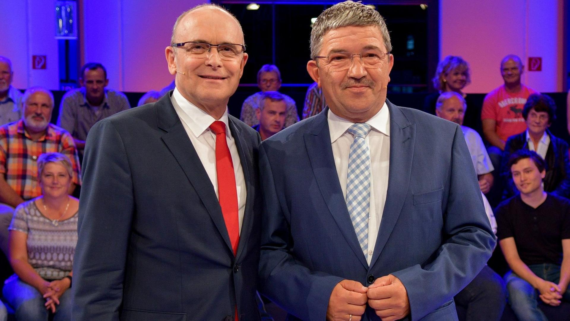TV-Duell der Spitzenkandidaten für die Landtagswahl in Mecklenburg-Vorpommern: Ministerpräsident Erwin Sellering (SPD, links) und der stellvertretende Ministerpräsident Lorenz Caffier (CDU)