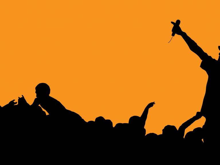 Silhouette eines Rappers während eines Konzerts