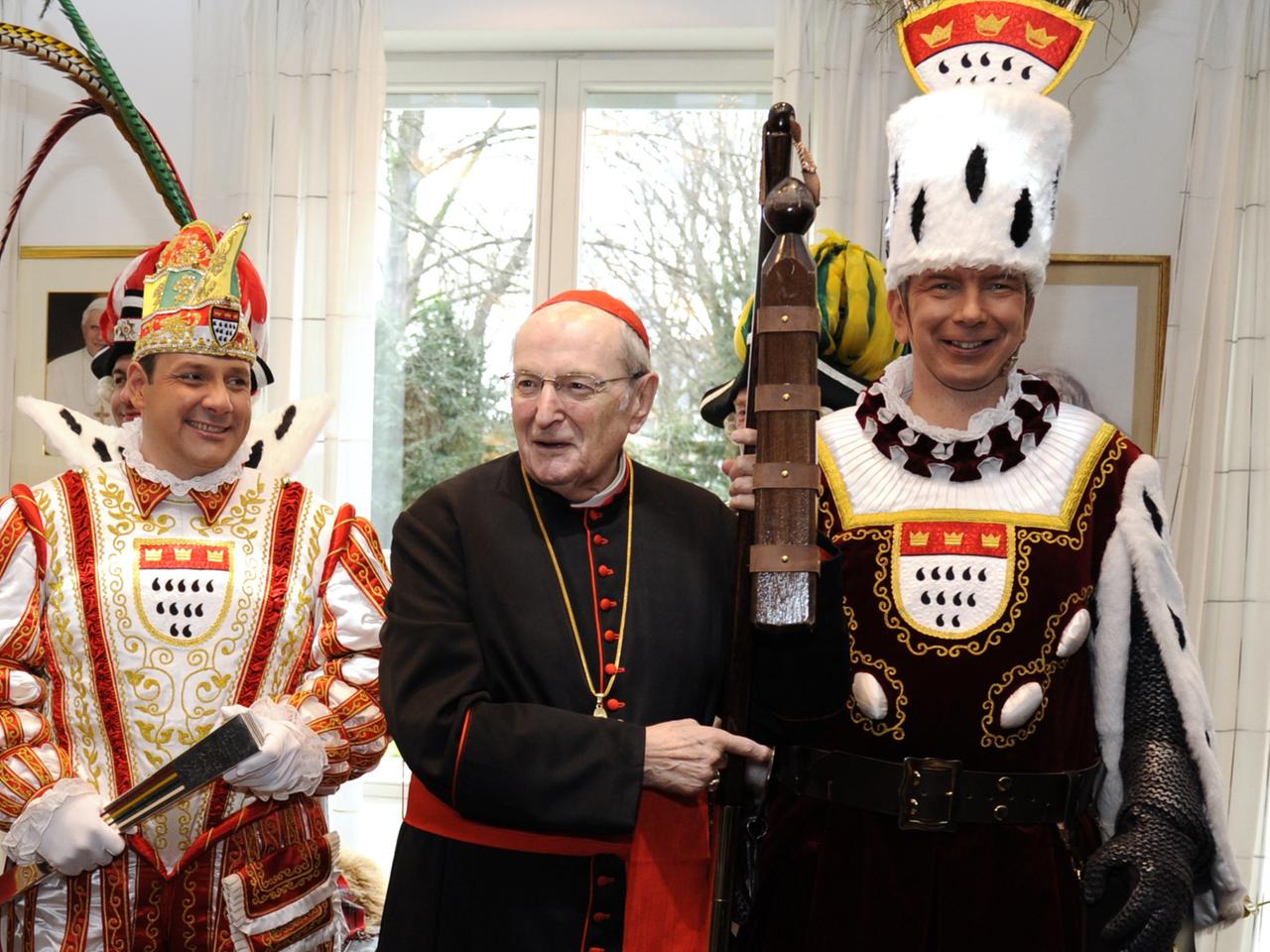 Joachim Kardinal Meisner (M.) beim Empfang des Kölner Dreigestirns der Karnevalssession 2014.