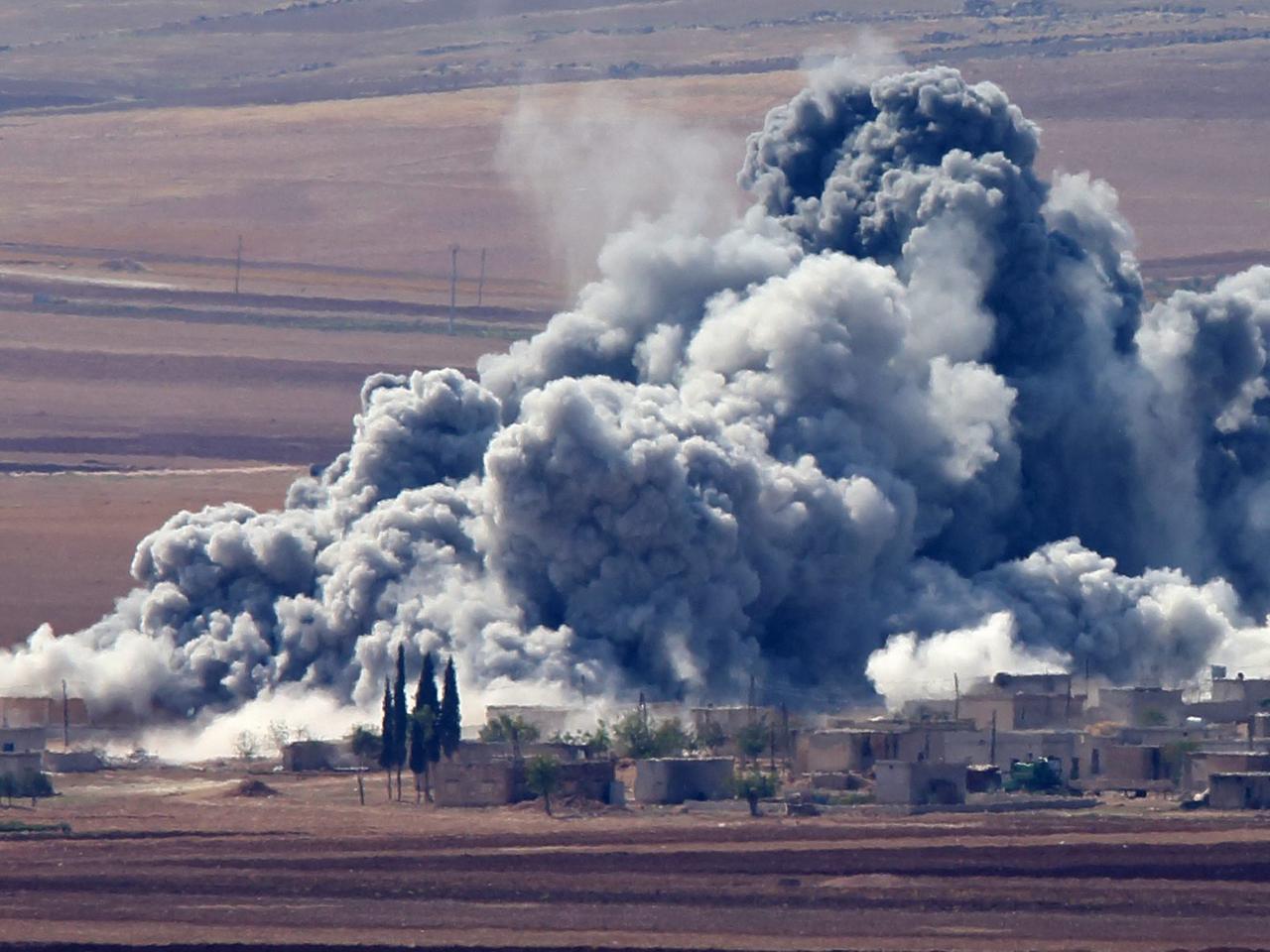  Angriff auf ein Dorf in der Nähe von Kobane