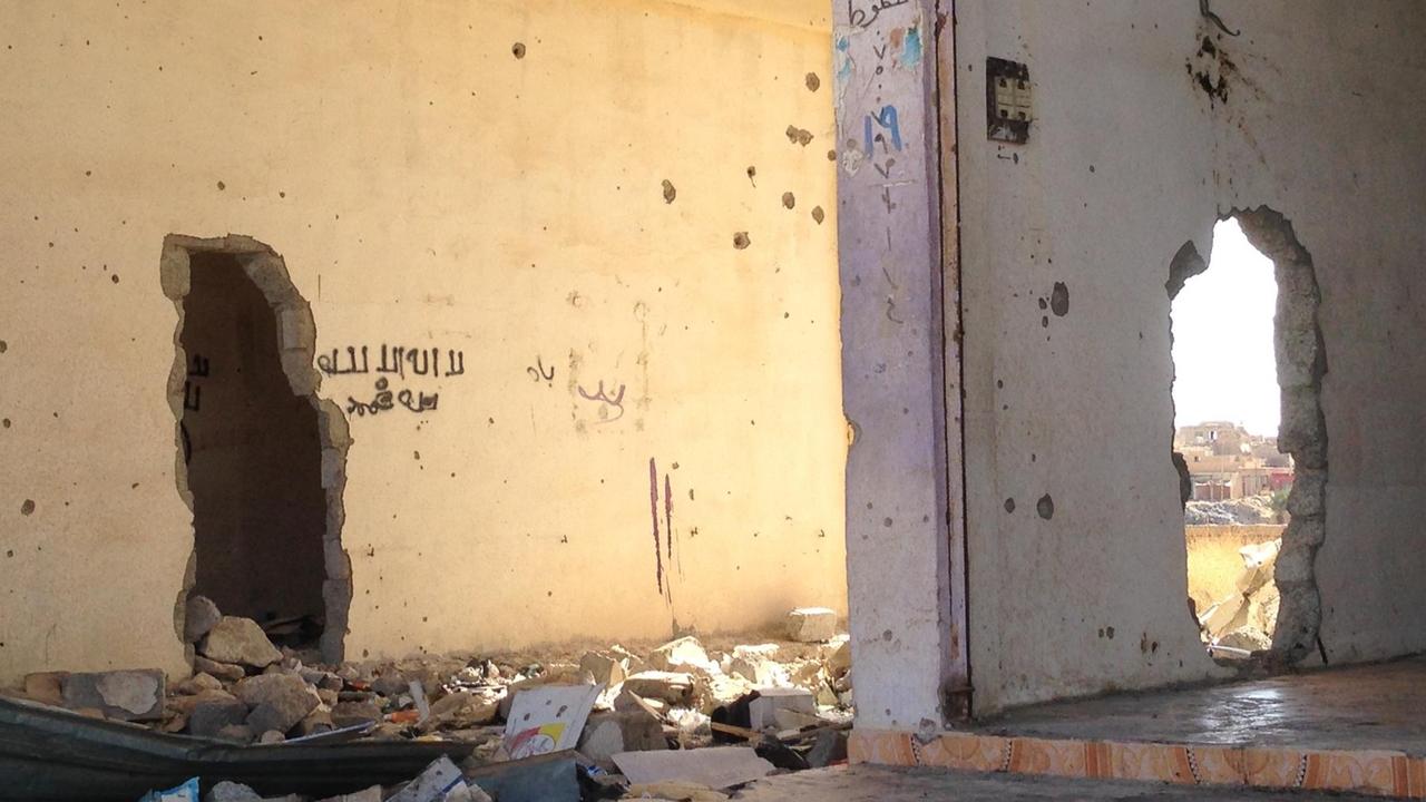 "La illaha ilallah": "Es gibt keinen Gott außer Gott" steht auf einer übrig gebliebenen Wand eines zerbombten Hauses