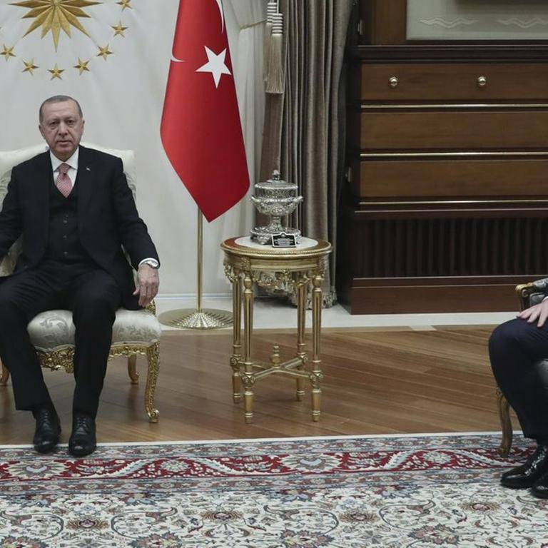 Turkey's President Recep Tayyip Erdogan, center, accompanied by Turkey's Economy Minister Berat Albayrak, right, who is also his son-in-law, meets with Jared Kushner, left, U.S. President Donald Trump's adviser and son-in-law, at the Presidential Palace in Ankara, Turkey, Wednesday, Feb. 27, 2019.