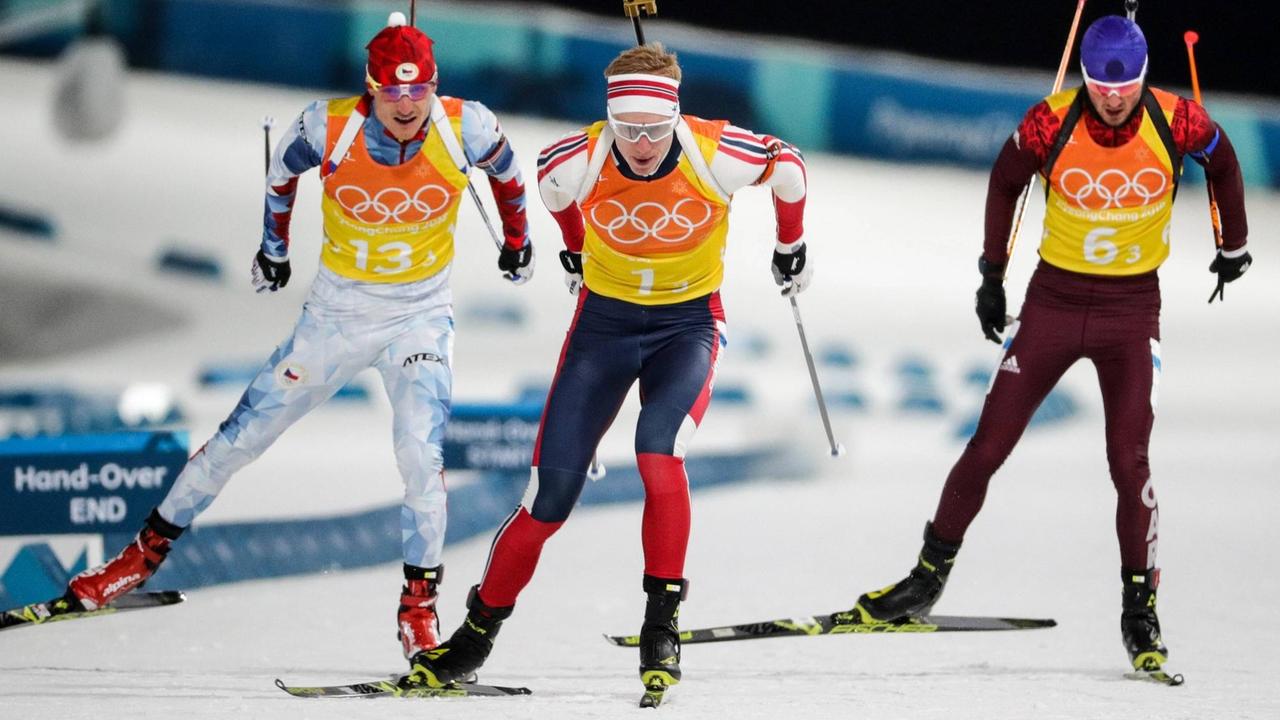 Die Biathleten Ondrej Moravec, der Norweger Johannes Thingnes Boe und Anton Babikov bei den Olympischen Spielen in Südkorea.