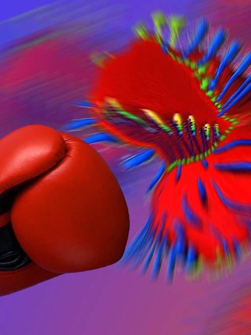 Ein Boxhandschuh wehrt den Angriff eines Virus ab.