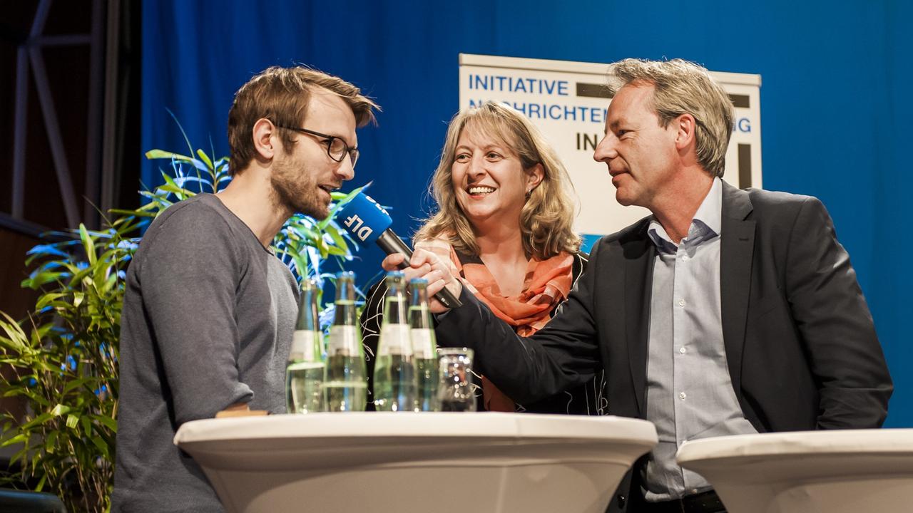 DLF-Sportjournalist Philipp May, die Leiterin der Sportredaktion Astrid Rawohl und Nachrichtenchef Marco Bertolaso (v.l.n.r.)
