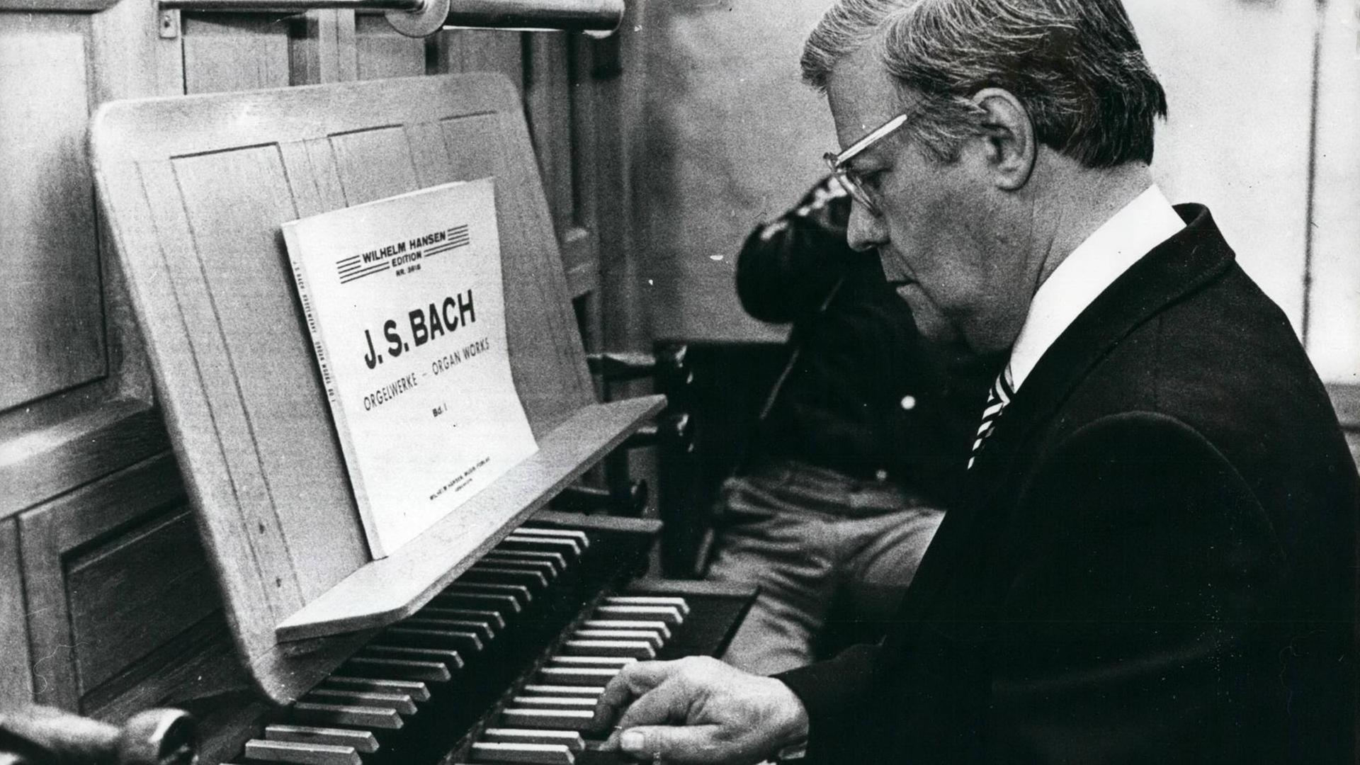 1980 - Helmut is Bach: Evidently Helmet Schmidt, prefers Bach to Strauss, Schmidt recently received the confidence of his compatriots to continue as Prime Minister of Germany. Photo shows Here he is playing the organ in a Danish church during recent visit to Denmark |