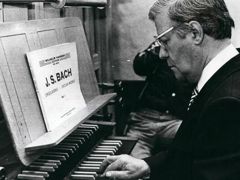 1980 - Helmut is Bach: Evidently Helmet Schmidt, prefers Bach to Strauss, Schmidt recently received the confidence of his compatriots to continue as Prime Minister of Germany. Photo shows Here he is playing the organ in a Danish church during recent visit to Denmark |