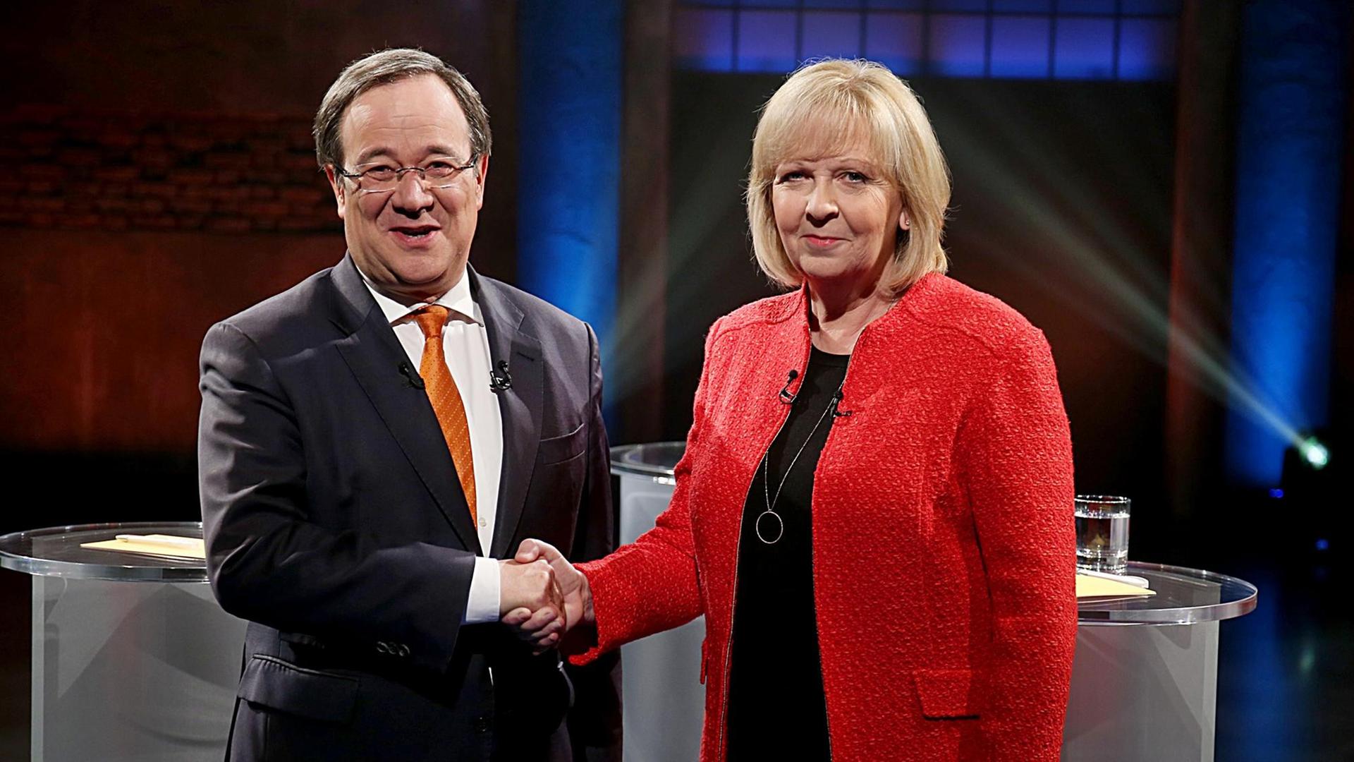 Armin Laschet (l), CDU-Spitzenkandidat für die Landtagswahl in Nordrhein-Westfalen, und die nordrhein-westfälische Ministerpräsidentin Hannelore Kraft (SPD).