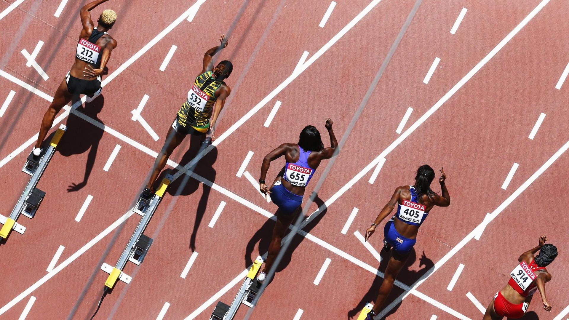 epa04899789 Competitors at the start of heat 7 in the women's 100m Hurdles heats during the Beijing 2015 IAAF World Championships at the National Stadium, also known as Bird's Nest, in Beijing, China, 27 August 2015. EPA/DIEGO AZUBEL |