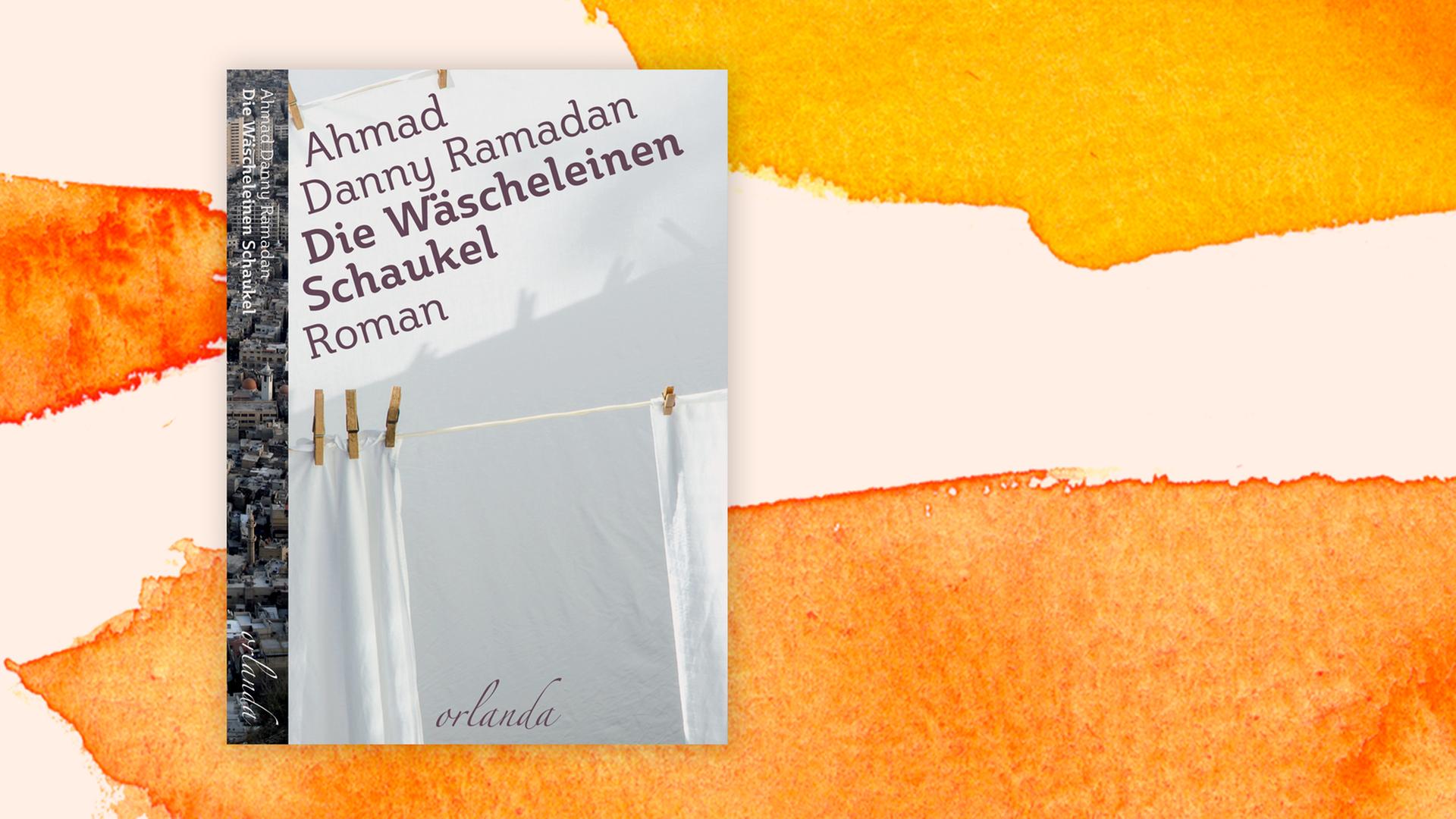 Cover des Buchs "Die Wäscheleinen-Schaukel" von Ahmad Danny Ramadan vor einem teils orangefarbenen Aquarellhintergrund