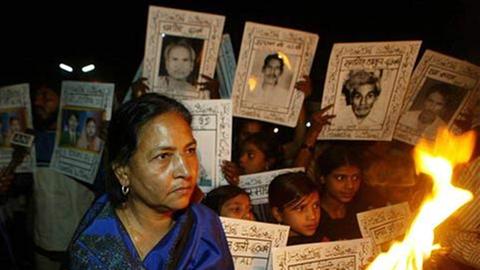 Überlebende der Gas-Katastrophe demonstrieren in Bhopal. 


