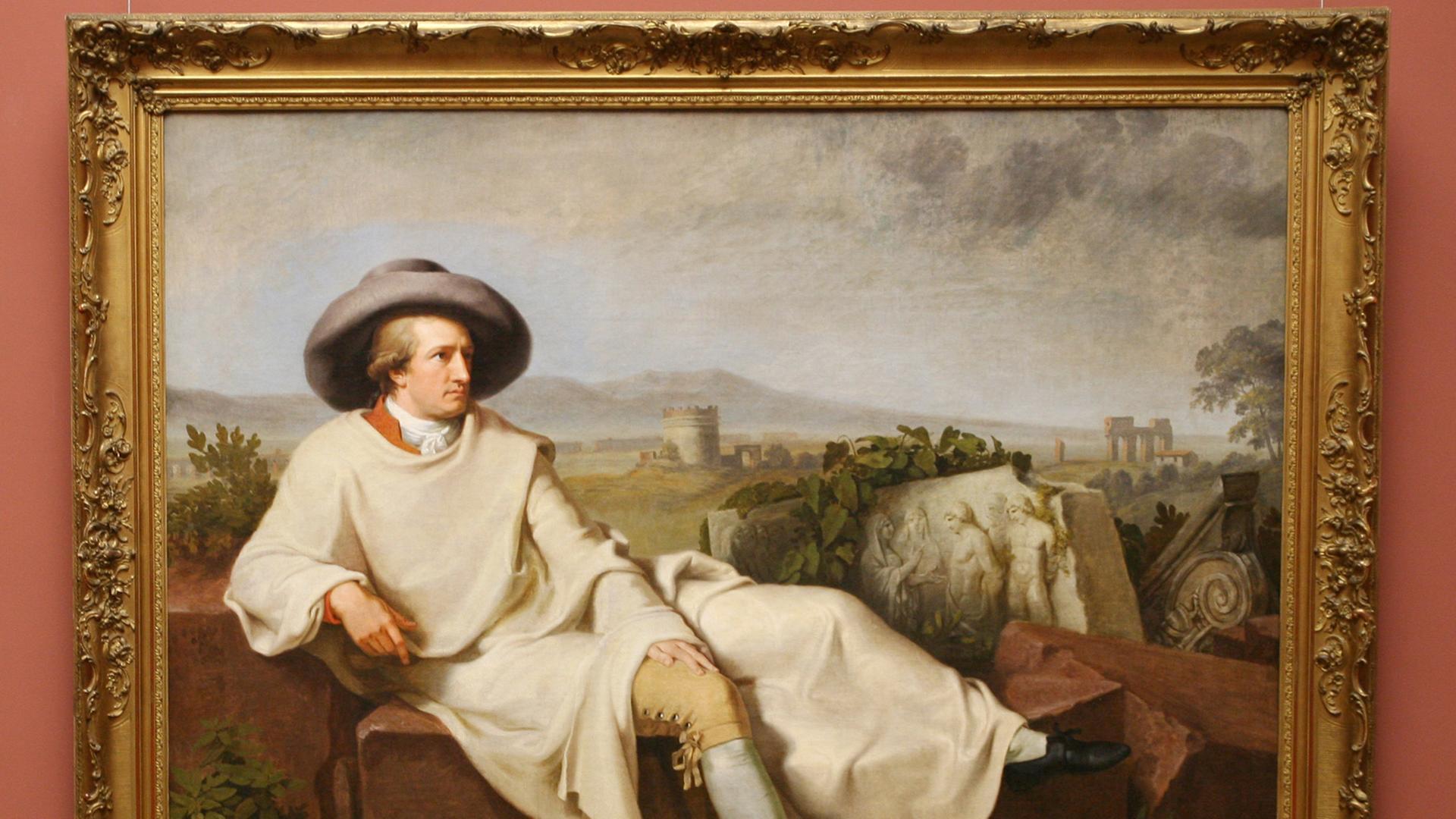 Auf dem Bild "Goethe in der römischen Campagna" von Johann Heinrich Wilhelm Tischbein liegt Goethe hingebettet vor einer italienischen Landschaft