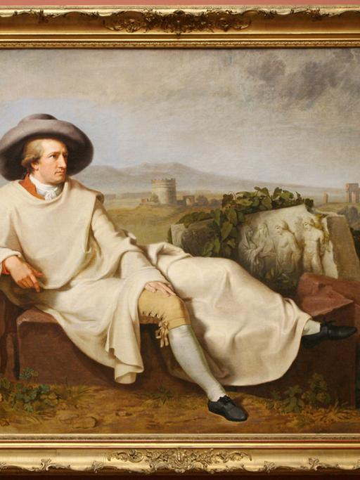 Auf dem Bild "Goethe in der römischen Campagna" von Johann Heinrich Wilhelm Tischbein liegt Goethe hingebettet vor einer italienischen Landschaft