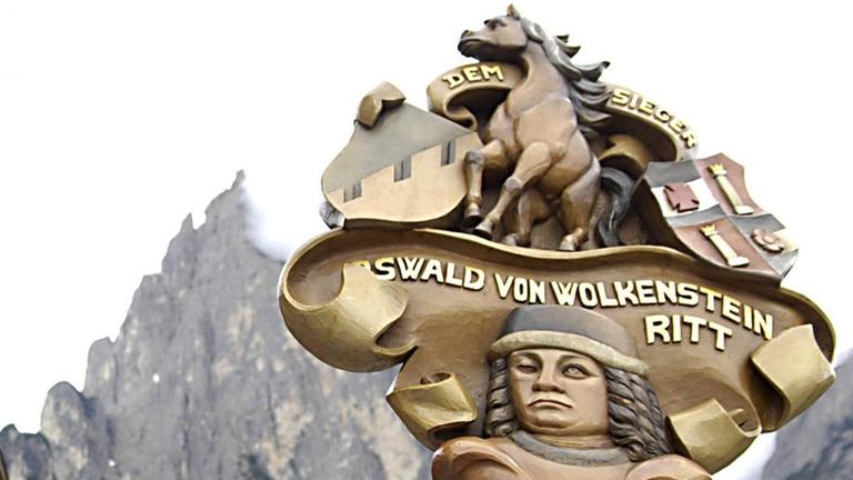 Das aus Holz geschnitzte Konterfei des Ritters von Wolkenstein, das deutlich ein blindes Auge zeigt. Die Holzfigur wird bei dem nach ihm benannten Ritt von den Teilnehmenden durch die Berge getragen.