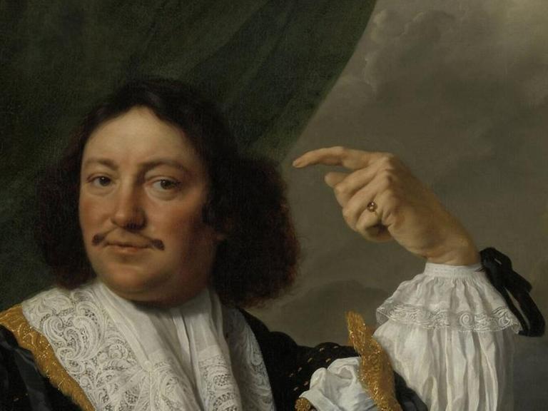 Auf einem Gemälde von Bartholomeus van der Helst um 1668 ist ein Mann vor Seekulisse zu sehen, der mit einem Zeigefinger auf sein Ohr weist.