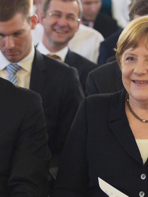 Der EKD-Ratsvorsitzende Heinrich Bedford-Strohm und Bundeskanzlerin Angela Merkel