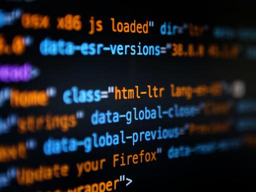 Ein Ausschnitt aus einem Computerbildschirm in der Nahaufnahme, darauf sind einzelne Befehle der Programmiersprache HTML zu sehen.