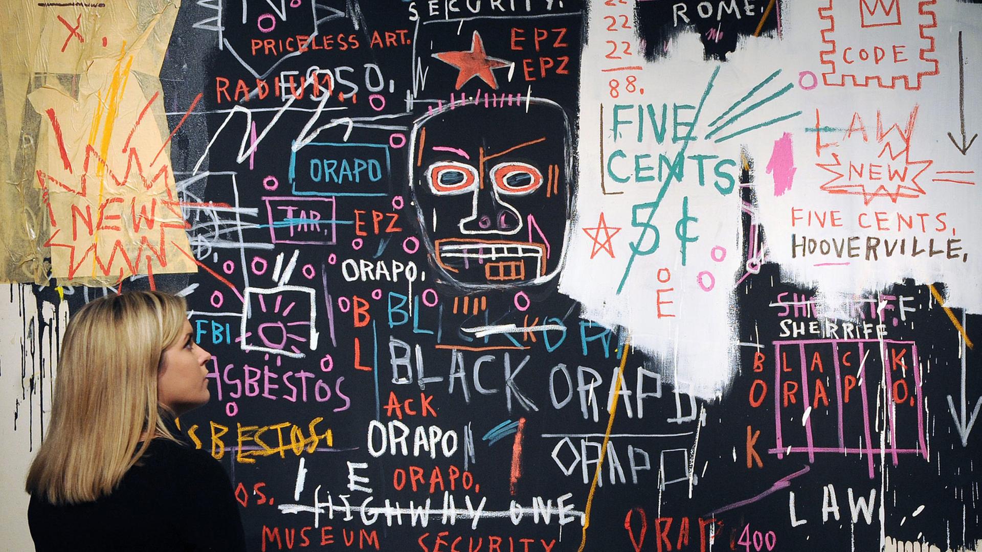 Ein Bild des US-Künstlers Jean-Michel Basquiat bei einer Versteigerung des Auktionshauses Christie's in London. Ein Bild des US-Künstlers Jean-Michel Basquiat bei einer Versteigerung des Auktionshauses Christie's in London.