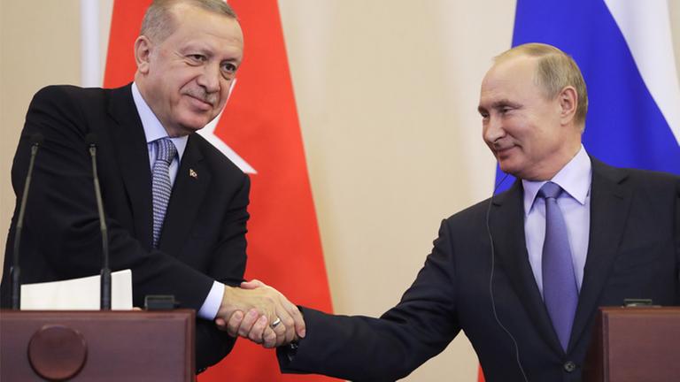SOCHI, RUSSIA - OCTOBER 22, 2019: Turkey s President Recep Tayyip Erdogan (L) and Russia s President Vladimir Putin shake hands at a joint news conference on Syria following their meeting in Sochi, Russia. Mikhail Metzel/TASS PUBLICATIONxINxGERxAUTxONLY TS0BFF3A