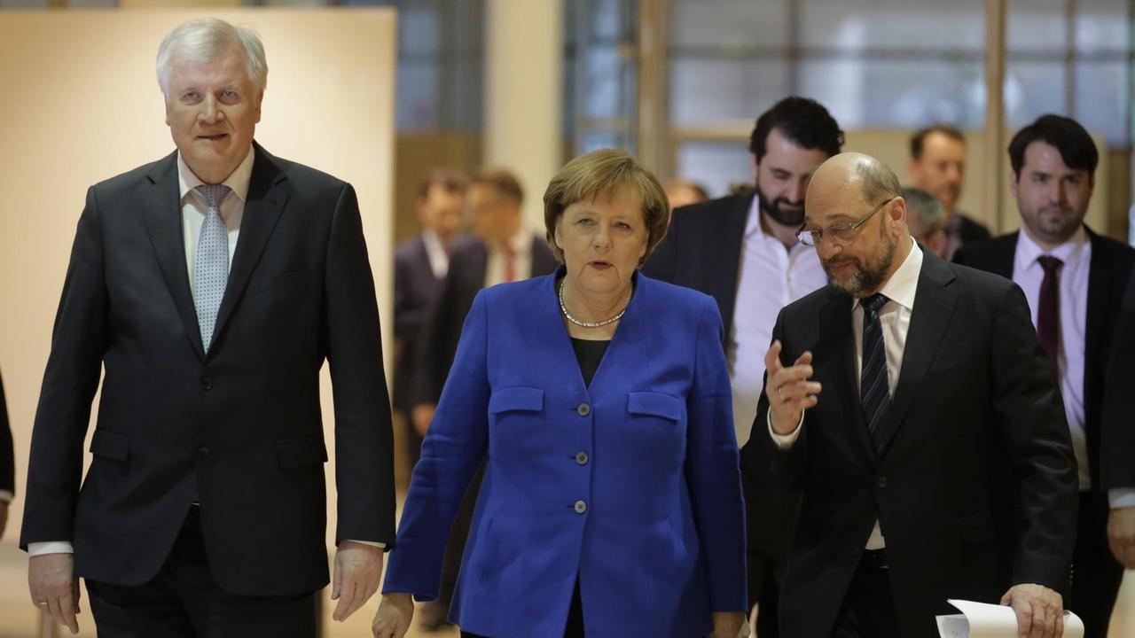 Bundeskanzlerin Merkel/CDU, Horst Seehofer/ CSU und Martin Schulz/SPD nach den Sondierungsgesprächen am 12.01.2018 in Berlin.