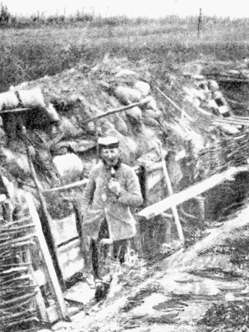 Ein deutscher Soldat in einem Schützengraben vor Ypern am 24. April 1915.