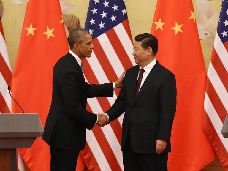 US-Präsident Obama und Chinas Staatspräsident Xi schütteln sich die Hände.