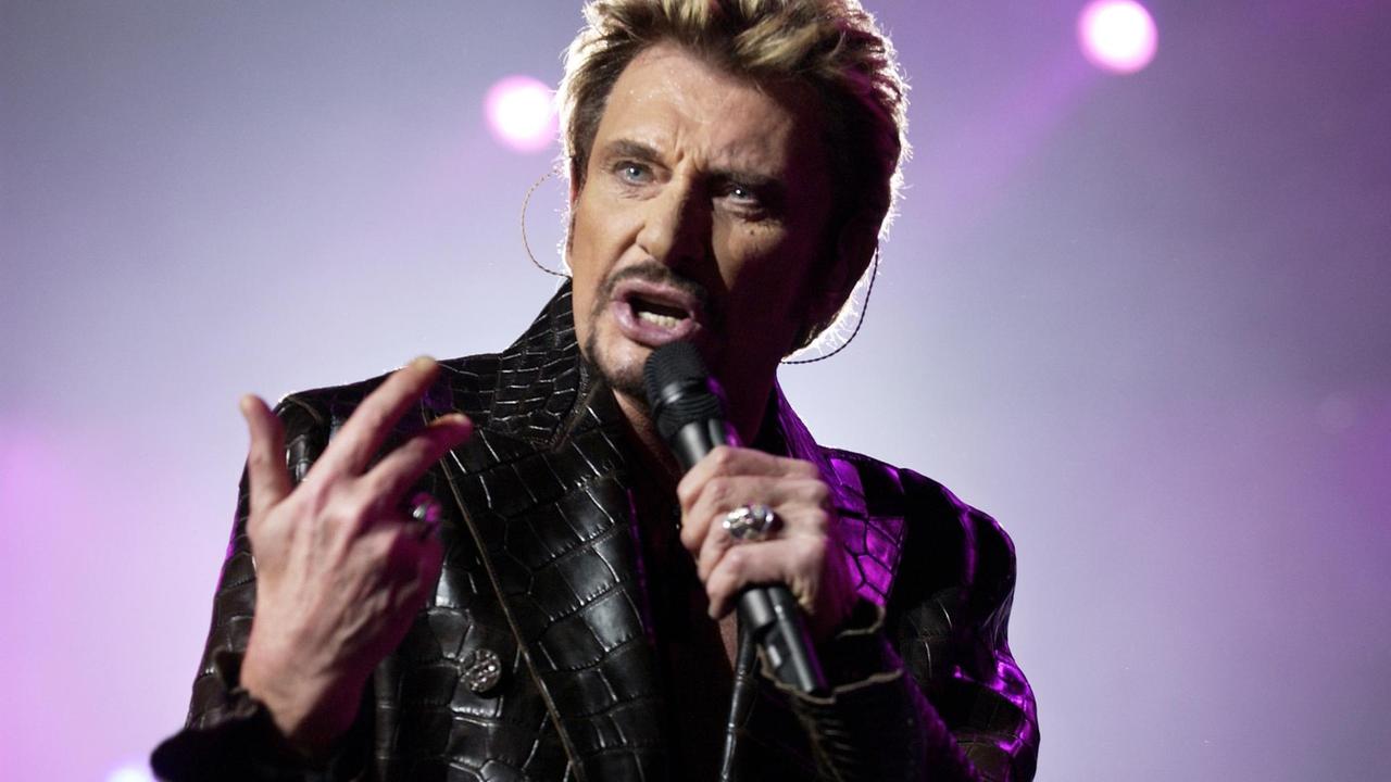 Das Bild zeigt den Rockmusiker Johnny Hallyday im Jahr 2003.